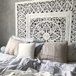 A simply designed wooden headboard